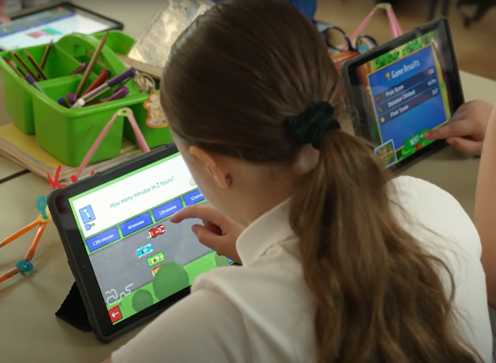 Child playing Sumdog in class 1024 x 750